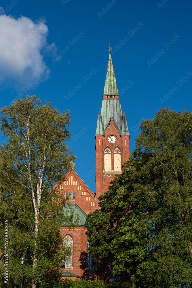 The church of Forssa (Finnish - Forssan kirkko) on a sunny summer evening. Forssa, Finland.