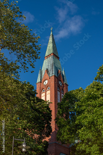 Fototapeta Naklejka Na Ścianę i Meble -  The church of Forssa (Finnish - Forssan kirkko) on a sunny summer evening. Forssa, Finland.