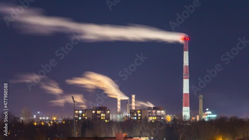 Time-lapse of industrial district and smoke polluting the air. Lithuania Panevezys Europe.
Night sky at winter season. photo