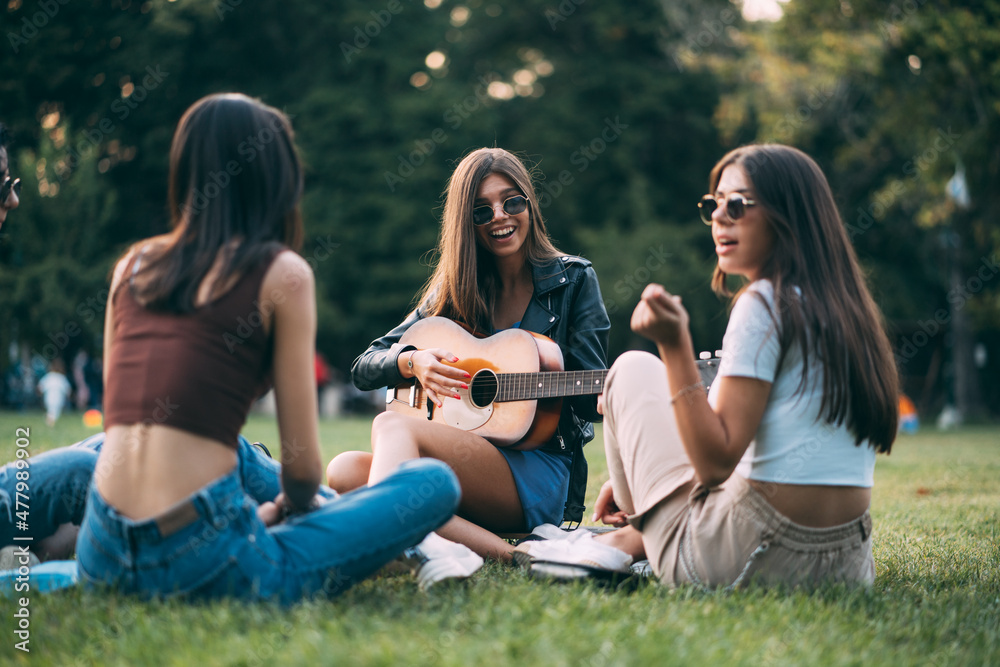 Fototapeta premium Enjoying their time together with the guitar