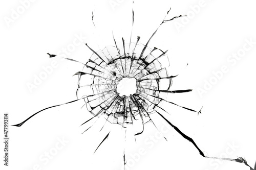 Shot hole, texture of cracks on the glass. Broken windshield. Damaged car window