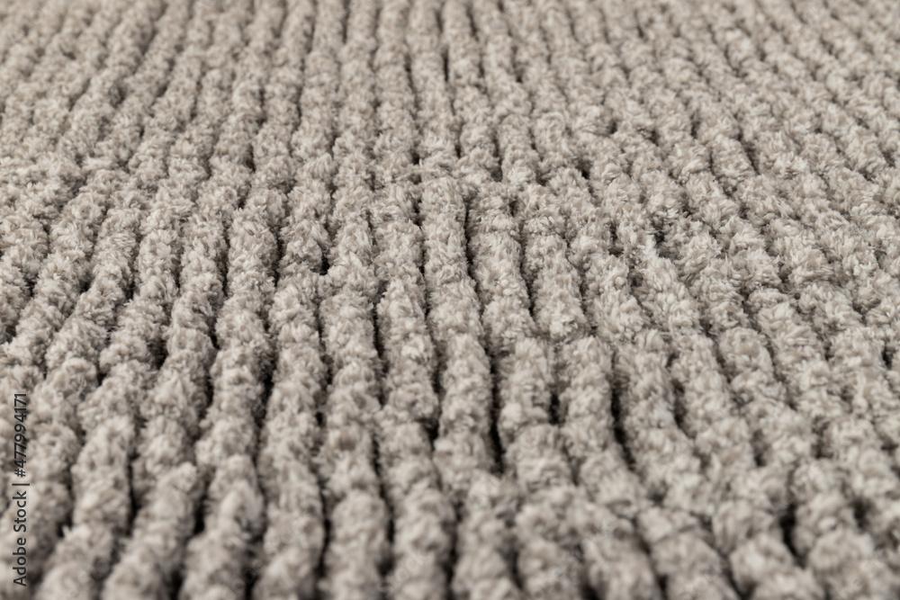 Gray chenille soft bath mat texture background. Bath Accessories. Top view. Gray chenille soft bath mat texture background. Bath Accessories. Top view.