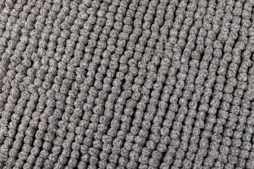 Gray chenille soft bath mat texture background. Bath Accessories. Top view.