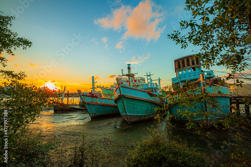 Fishing boat in the sea at sunset around southern part of thailand 