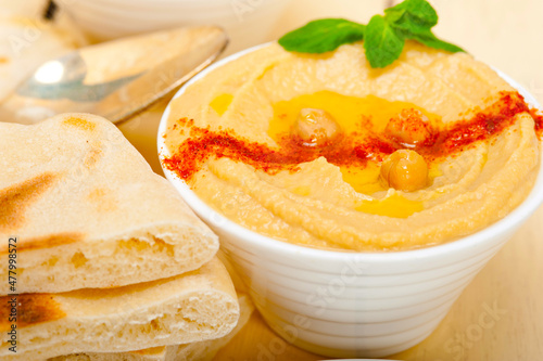 Hummus with pita bread photo