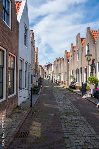 Fototapeta Naklejka Na Ścianę i Meble -  Walking in old Dutch town Zierikzee with old small houses and streets