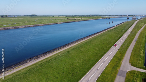 Wallpaper Mural Aerial view on green polders, meadows and water transportion channel in South Beveland, Zeeland, Netherlands Torontodigital.ca