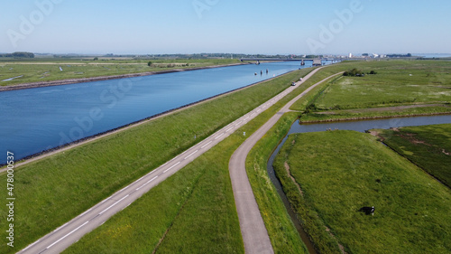 Foto Aerial view on green polders, meadows and water transportion channel in South Be