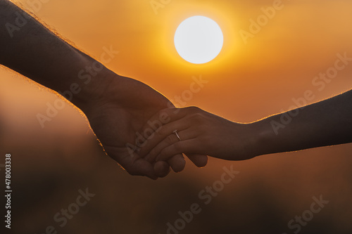 Hands on sunset