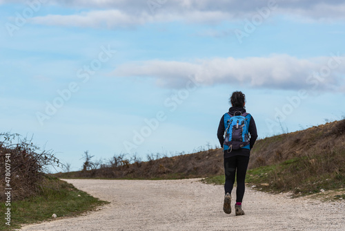 Woman taking a rural walk