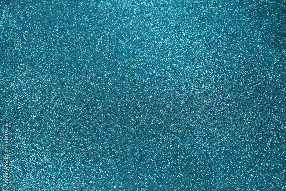 Obraz premium Turquoise glitter background, iridescent surface