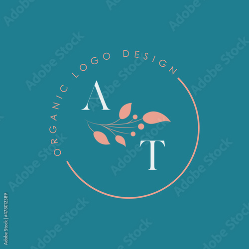 AT or A T organic letter logo design on a circle shape frame with botanical flower elements, vector illustration. Natural pastel icon.