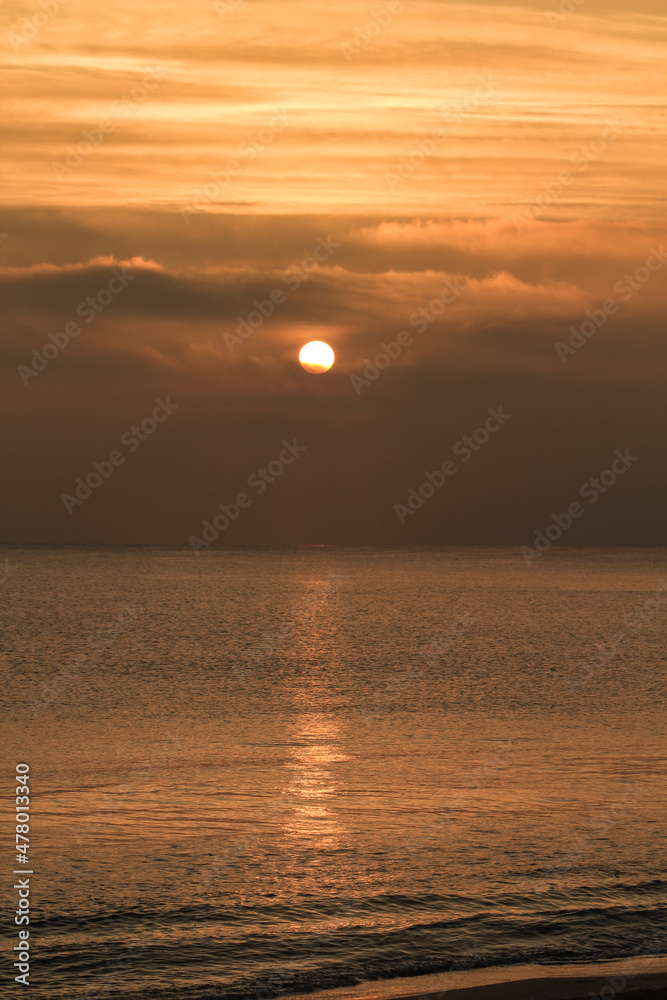 Colorful sun at sunrise over the sea in southern Spain
