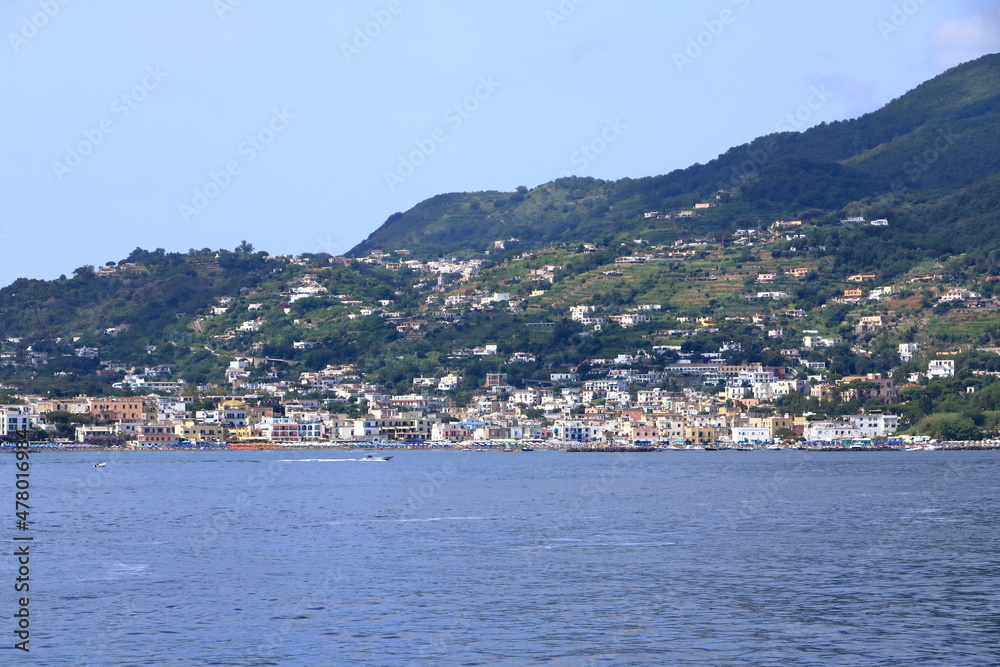 view to Ischia Ponte village and the coastline from the boat