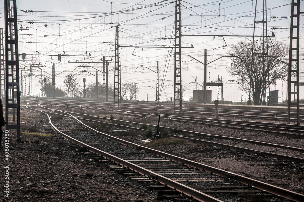 Old train tracks forgotten on a foggy day