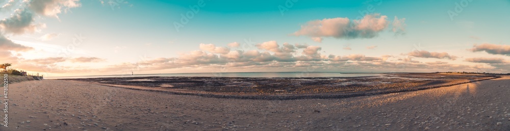 Panoramic view of Re island beaches at sunrise with a very calm sea. beautiful minimalist seascape. vintage tones