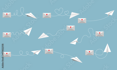Flying paper airplane with dotted air route and envelope. Heart shaped.Paper planes with hearts.Set of envelopes,mail envelopes.Love card.