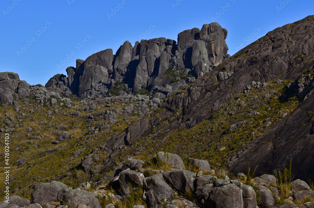 The huge granite boulders of the Pico das Prateleiras mountain (2.539m), in the high sector of Itatiaia National Park, Rio de Janeiro state, Brazil The huge granite boulders of the Pico das Prateleiras mountain (2.539m), in the high sector of Itatiaia National Park, Rio de Janeiro state, Brazil