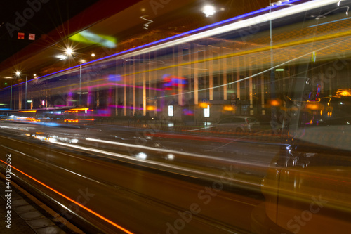 Tram Lights in the Busy Streets of a Big City at Night