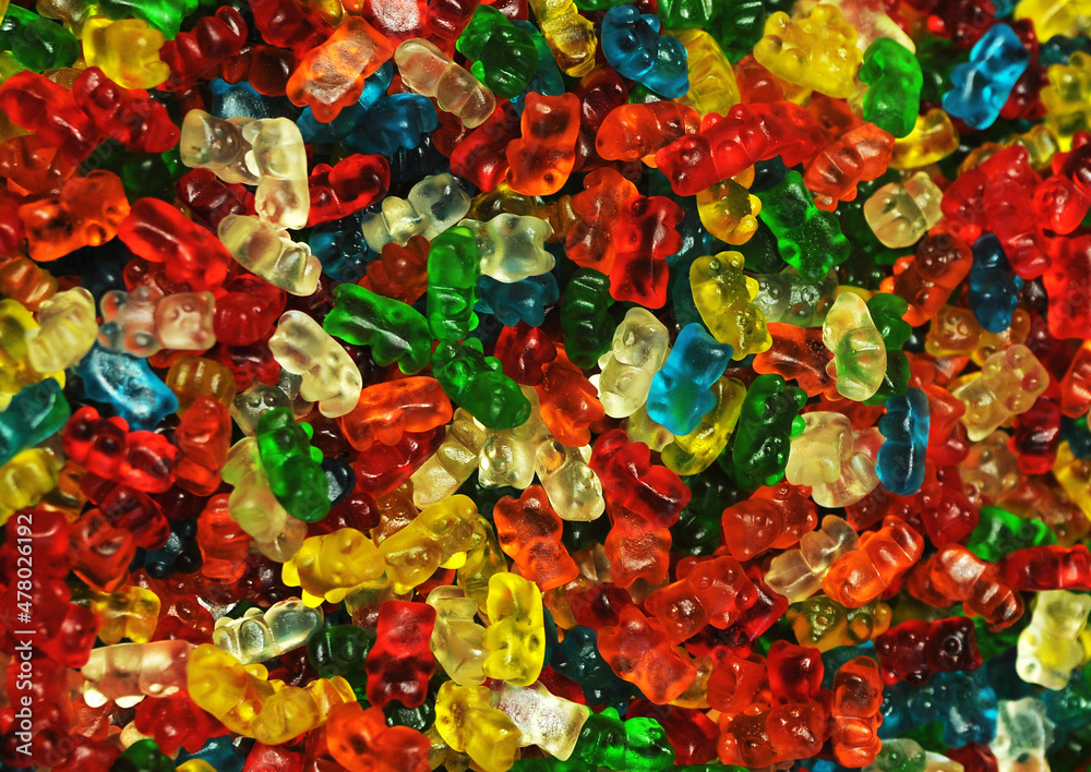 Delicious colorful jelly candies on background 