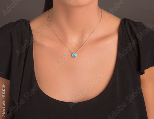 Jewelry. Gold chain necklace on woman