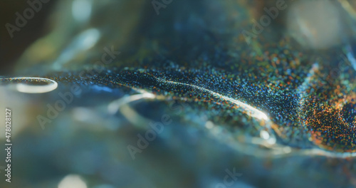 Green and Blue background with glowing dots bokeh style.  Shiny neon waves and glowing bokeh particles abstract wallpaper. Great for technology, science theme. 

