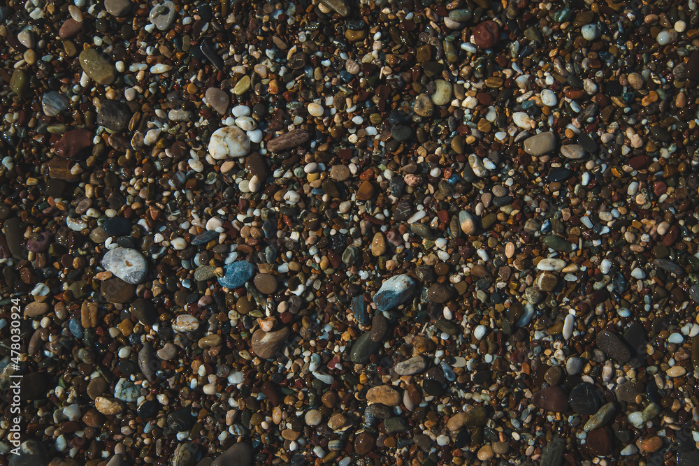 Pebbles on the beach by the sea. Selective focus. Pebbles on the beach by the sea. Selective focus.