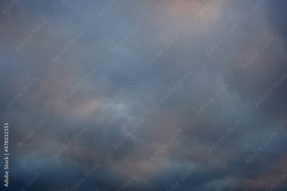 Tinted pastel cool colors background of cloudy sky at twilight in winter Tinted pastel cool colors background of cloudy sky at twilight in winter