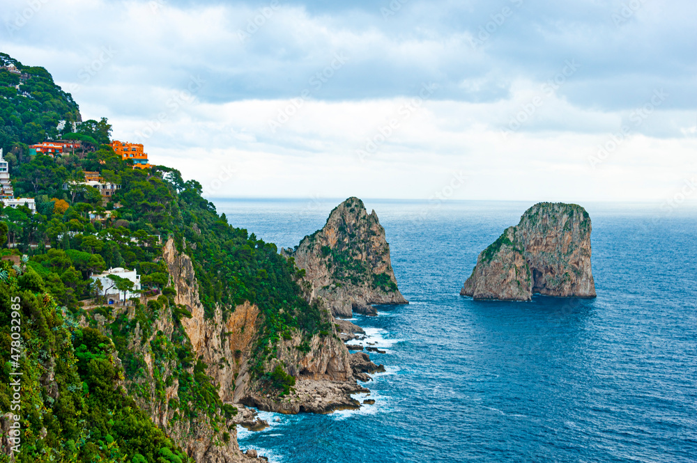 Coastline of the Island of Capri -apri's most iconic sight is the dramatic Faraglioni, three towering rock formations