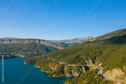 The green banks of Lac de Castillon in Europe, France, Provence Alpes Cote dAzur, Var, in summer, on a sunny day.