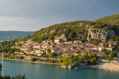 The town of Bauduen on its hill by the lake of Sainte Croix in Europe, France, Provence Alpes Cote dAzur, Var, in the summer on a sunny day.