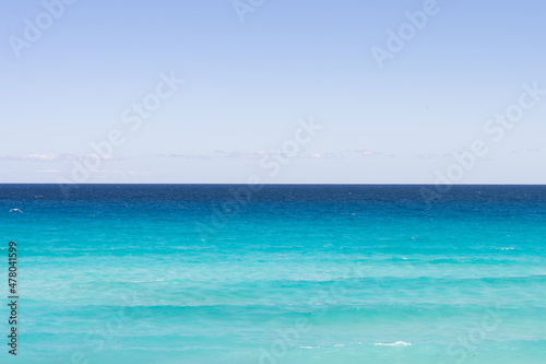 Touristic caribbean beach in Mexico with vivid blue spectrum © Diego
