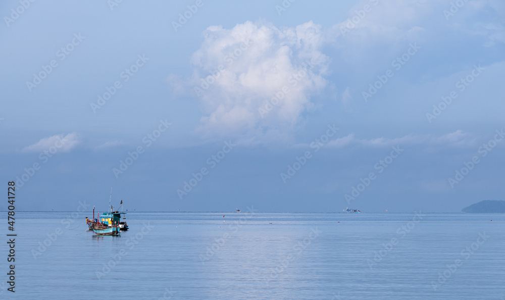 panorama fishing boats in the calm blue sea. Concept of natural and Thailand view.