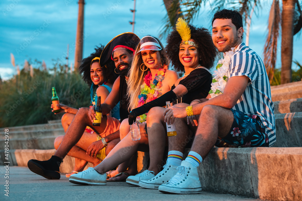 Φωτογραφία Carnaval Party in Brazil, brazilian friends together smiling at street festival in costume