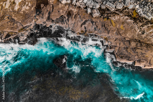 Long Exposure Drone Shot of Shelly Headland Waves