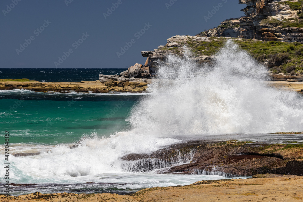Waves breaking on to rocks, Royal National Park N.S.W. Australia Waves breaking on to rocks, Royal National Park N.S.W. Australia