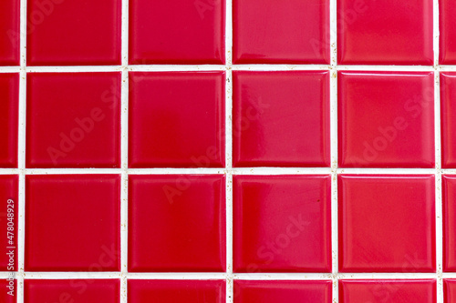 colored tiles in red color on a wall of rio de janeiro.
