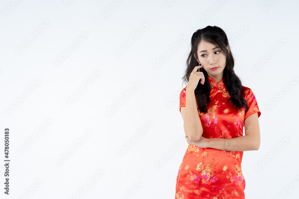 beauty woman wear cheongsam and smile to you in chinese new year beauty woman wear cheongsam and smile to you in chinese new year
