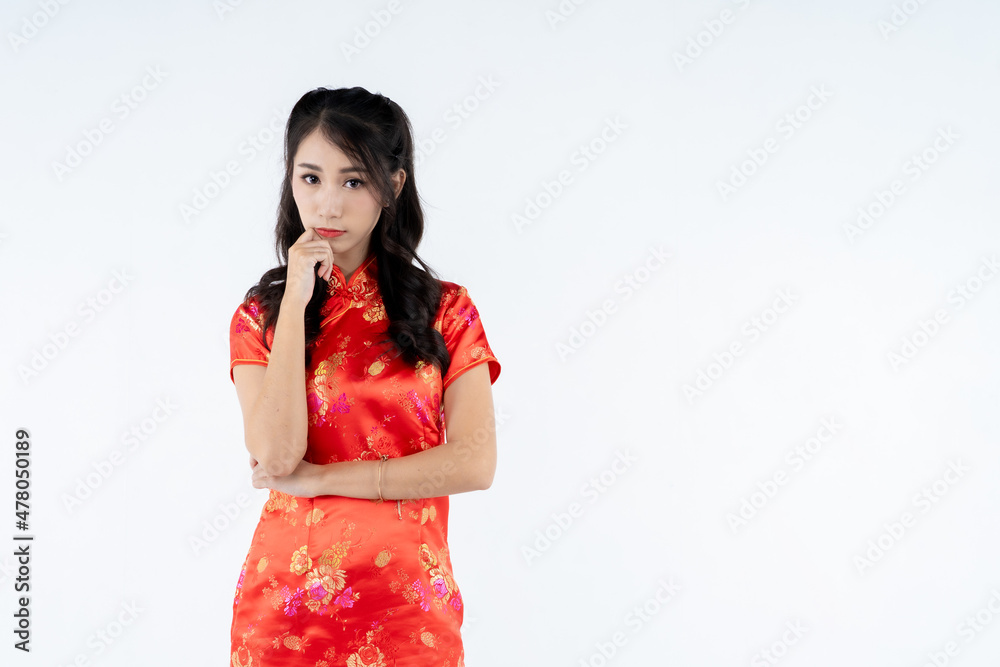 beauty woman wear cheongsam and smile to you in chinese new year beauty woman wear cheongsam and smile to you in chinese new year