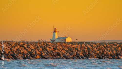 lighthouse at sunset in port colborne, canada