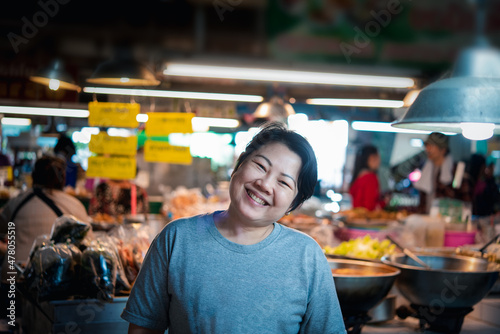 Woman at Thai street food in market