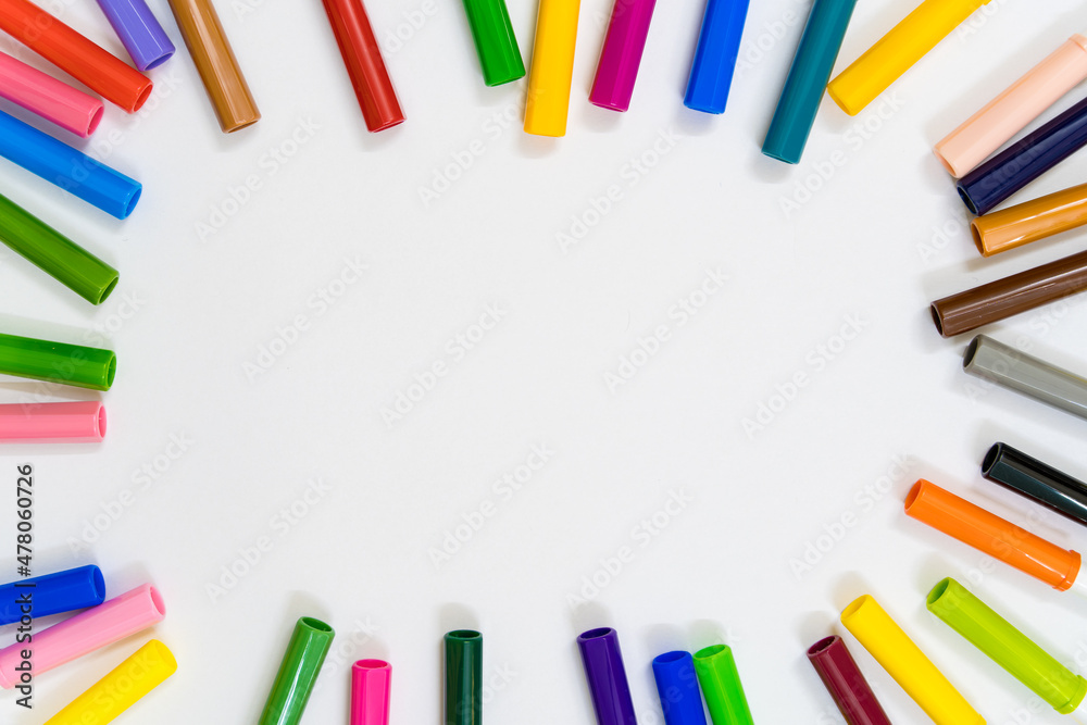Colorful stationary school supplies on white trending background with copyspace or text flat lay. Colorful Education or back to school Concept Colorful stationary school supplies on white trending background with copyspace or text flat lay. Colorful Education or back to school Concept