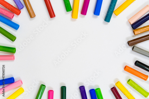 Colorful stationary school supplies on white trending background with copyspace or text flat lay. Colorful Education or back to school Concept