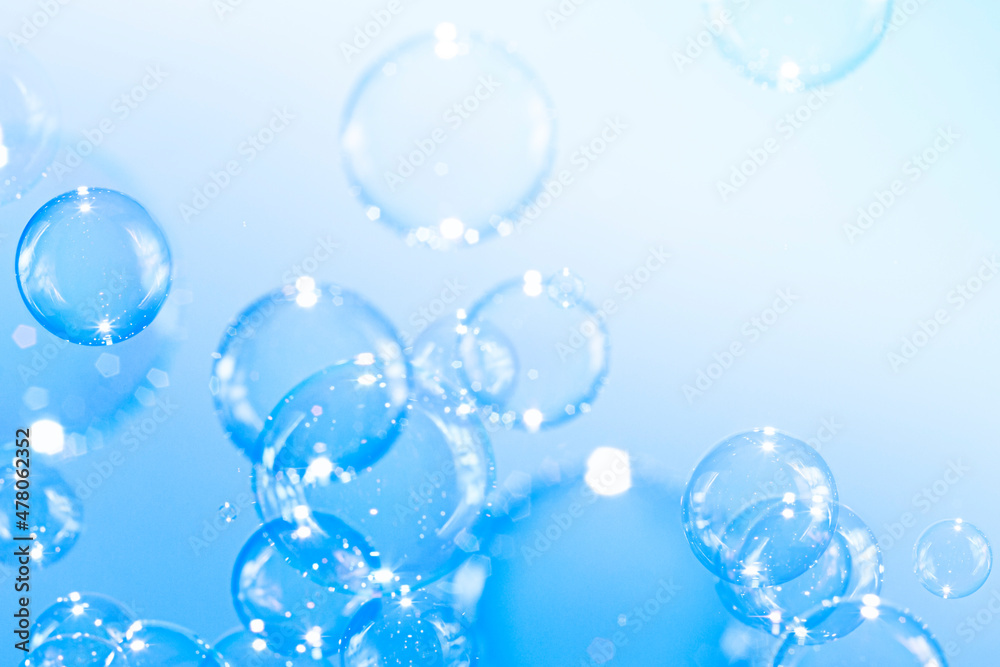 Beautiful Transparent Shiny Blue Soap Bubbles Background	
