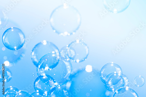 Beautiful Transparent Shiny Blue Soap Bubbles Background  