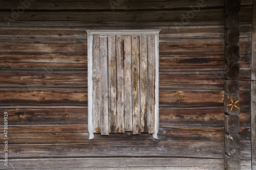 Window in an old wooden house. 