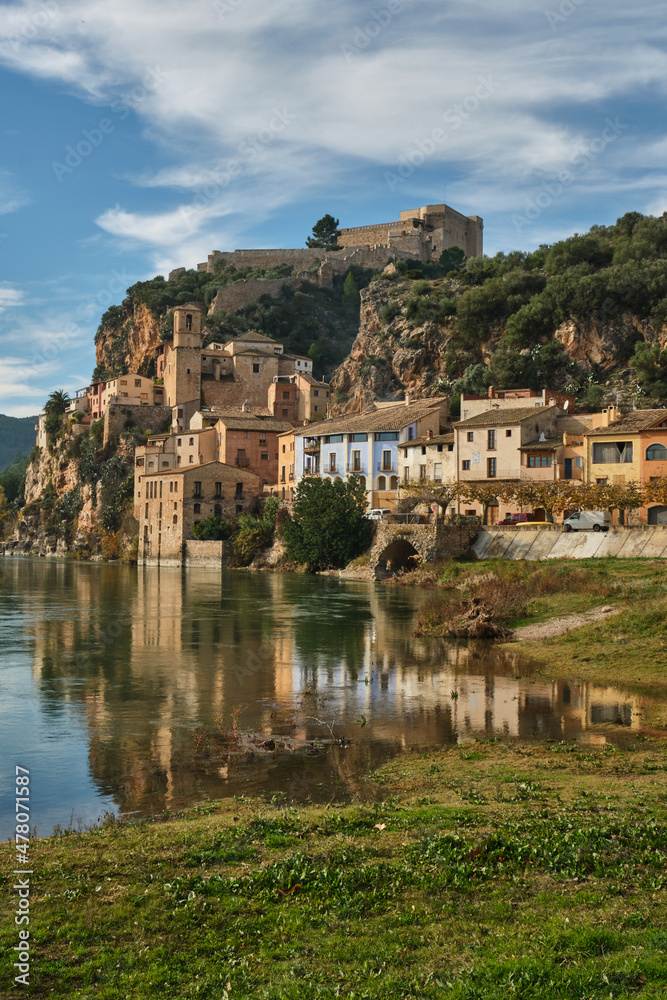 Miravet village and its Templar castle on top of the hill on the banks of the Ebro river, Tarragona, Spain
