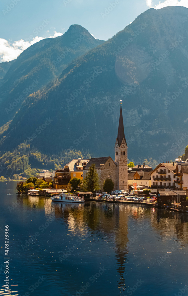 Beautiful alpine summer view with reflections at the famous Hallstaetter See lake near Hallstatt, Upper Austria, Austria