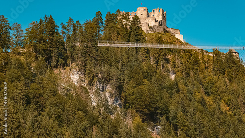 Beautiful alpine summer view with the famous Highline 179 suspension bridge and the Ehrenberg castle ruins near Reutte, Tyrol, Austria photo