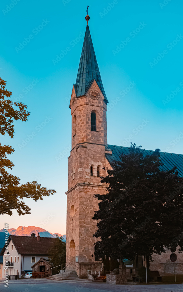 Beautiful alpine sunrise view with a church at Russbach, Salzburg, Austria